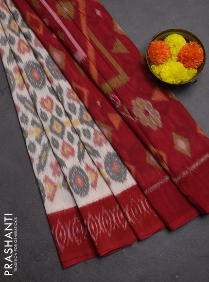 Ikat cotton saree off white and red with allover ikat weaves and ikat woven border