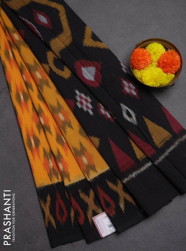 Ikat cotton saree sunset orange and black with allover ikat woven buttas and ikat woven border