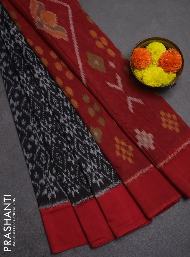 Ikat cotton saree black and red with allover ikat weaves and simple border