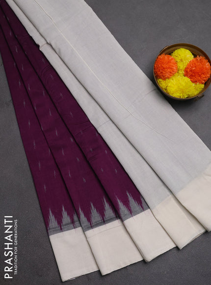 Ikat cotton saree purple and off white with allover ikat woven butta weaves and simple border