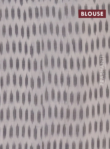 Ikat cotton saree purple and off white with allover ikat woven butta weaves and simple border