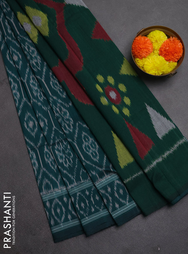 Ikat cotton saree peacock green with allover ikat woven butta weaves and ikat woven border