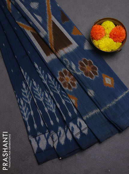 Ikat cotton saree peacock blue with allover ikat woven buttas and long ikat woven border