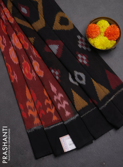 Ikat cotton saree deep maroon and black with allover ikat woven buttas and simple border
