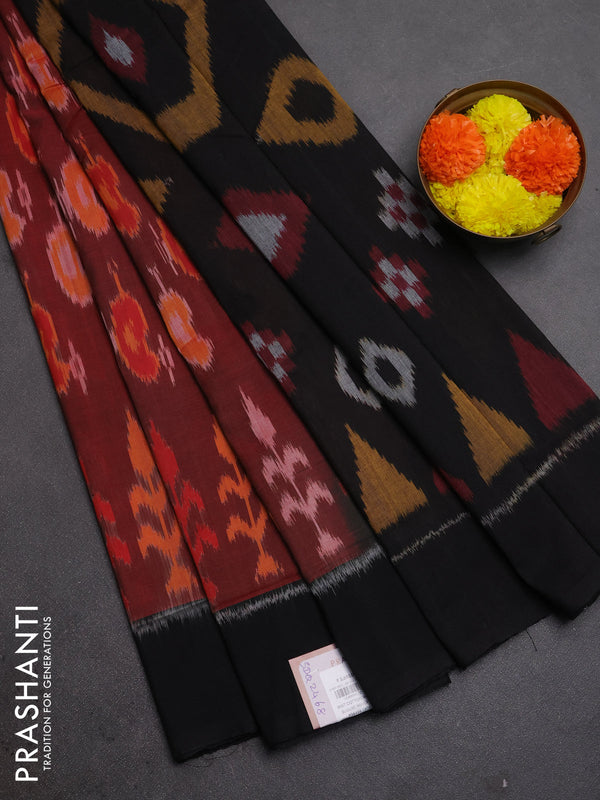 Ikat cotton saree deep maroon and black with allover ikat woven buttas and simple border