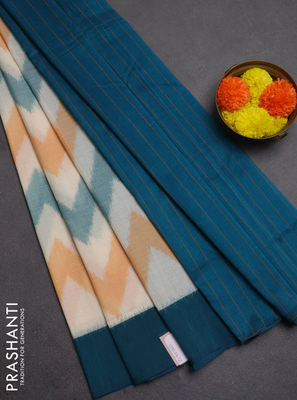 Ikat cotton saree off white and peacock green with allover ikat zigzag weaves and simple border