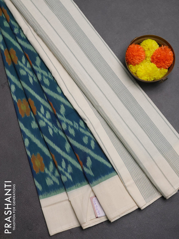 Ikat cotton saree peacock blue and off white with allover ikat weaves and simple border