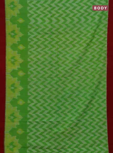 Ikat cotton saree light green and red with allover ikat zigzag weaves and simple border