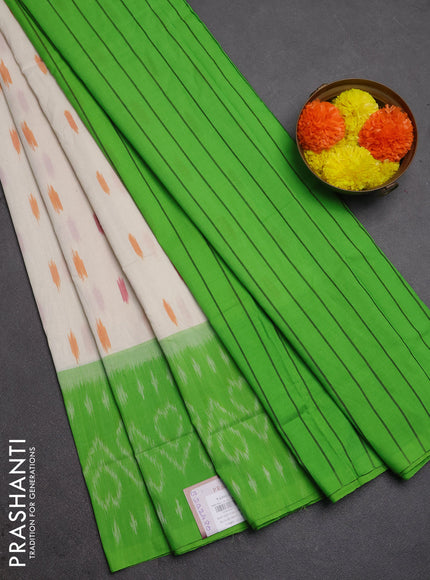 Ikat cotton saree off white and light green with allover ikat woven butta weaves and long ikat woven border