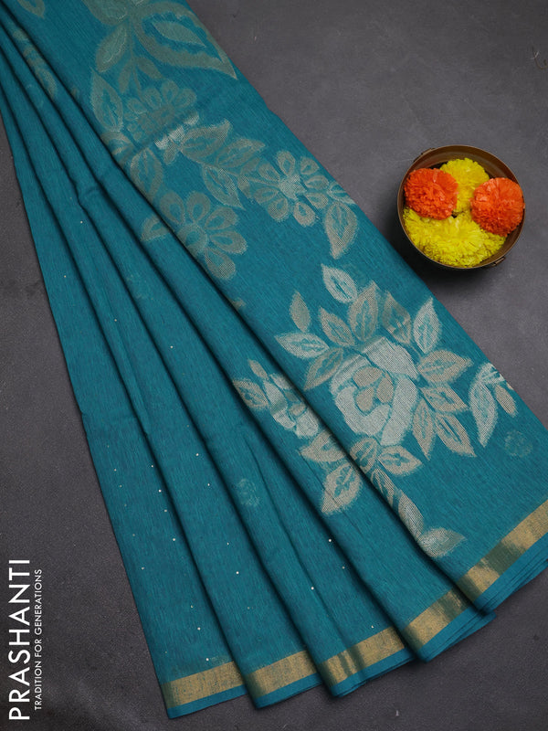 Jute silk saree teal blue with allover sequin work and zari woven border