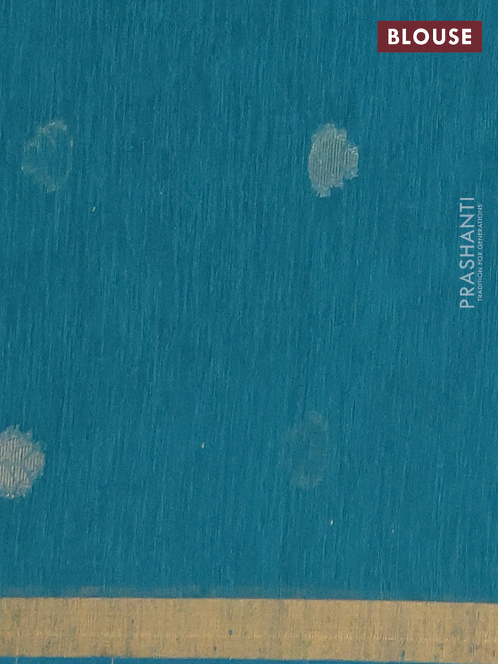 Jute silk saree teal blue with allover sequin work and zari woven border