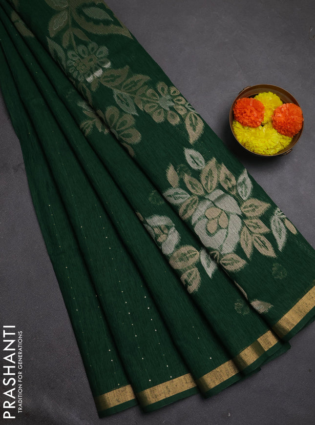 Jute silk saree bottle green with allover sequin work and zari woven border