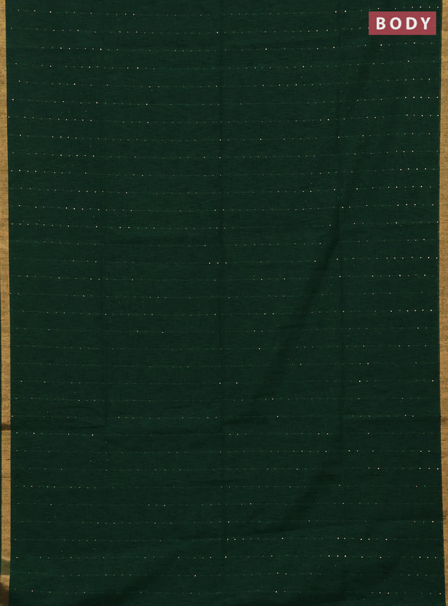 Jute silk saree bottle green with allover sequin work and zari woven border