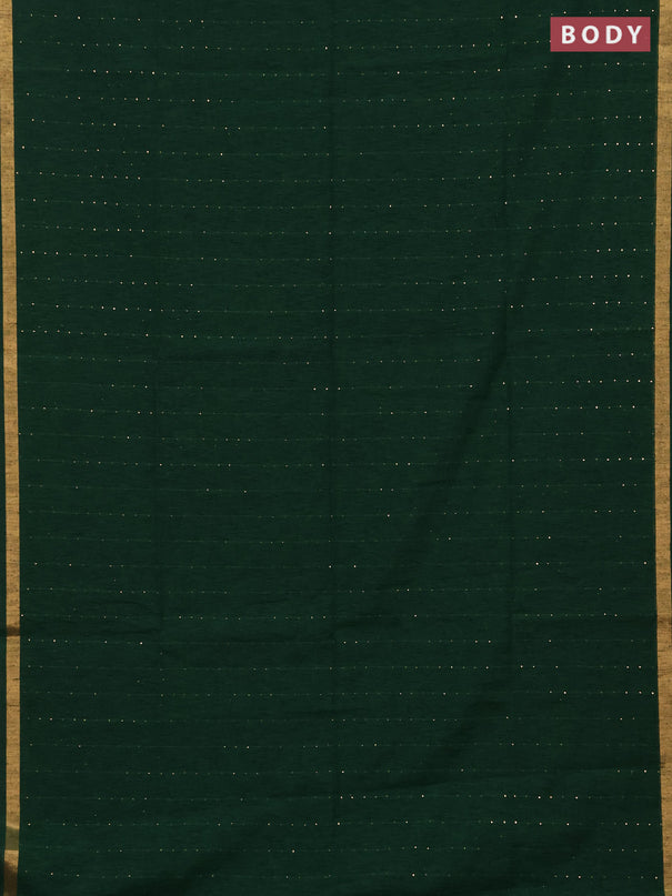 Jute silk saree bottle green with allover sequin work and zari woven border