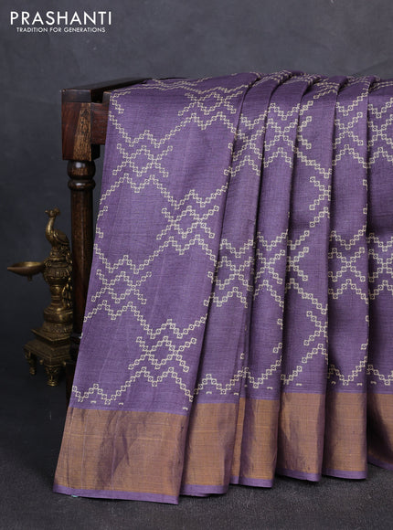 Pure tussar silk saree purple shade with allover prints and zari woven border