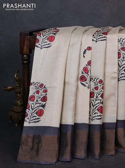 Pure tussar silk saree cream and elephant grey with butta prints and zari woven border