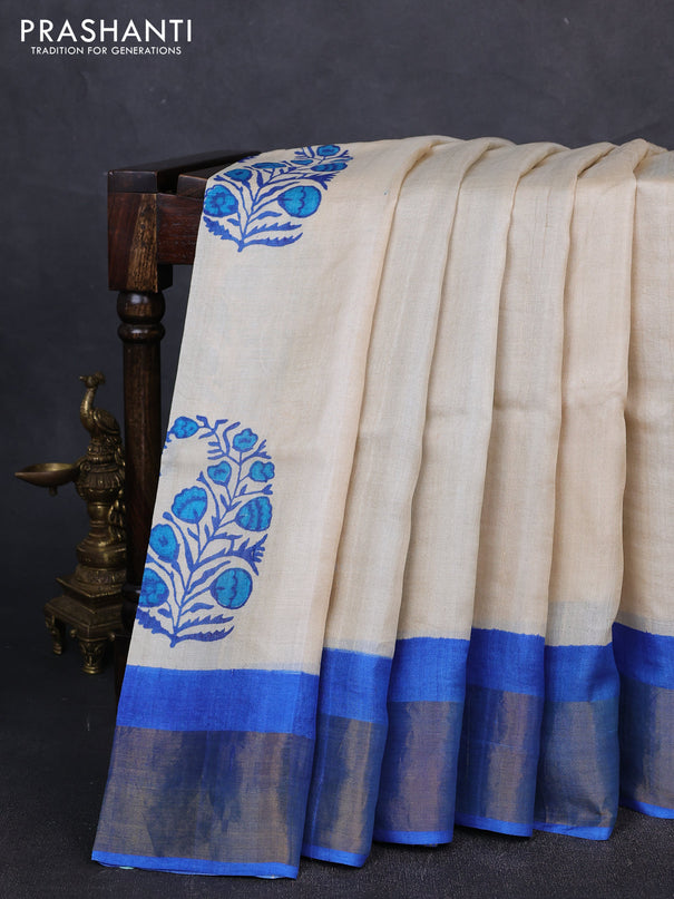 Pure tussar silk saree cream and blue with butta prints and zari woven border