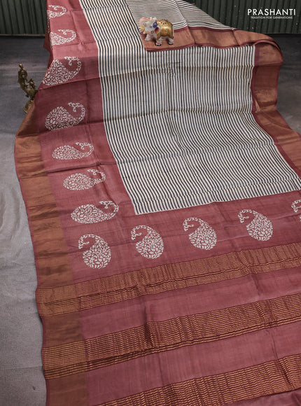 Pure tussar silk saree cream and rosy brown with allover stripe prints and long paisley printed zari woven border