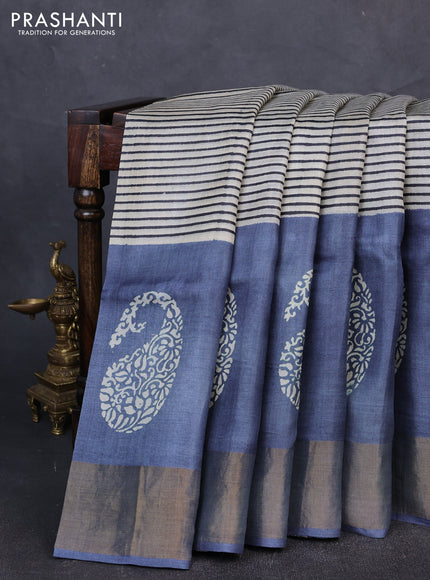 Pure tussar silk saree cream and grey with allover stripe prints and long paisley printed zari woven border