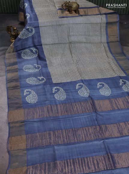 Pure tussar silk saree cream and grey with allover stripe prints and long paisley printed zari woven border
