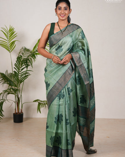 Pure tussar silk saree green shade and green with leaf butta prints and zari woven border