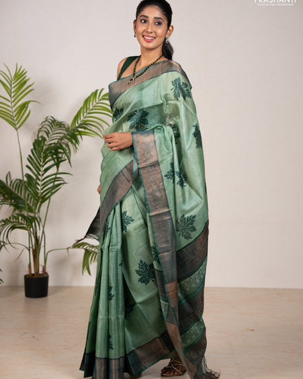 Pure tussar silk saree green shade and green with leaf butta prints and zari woven border