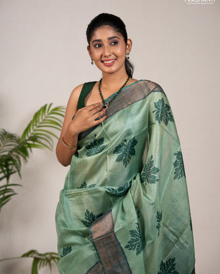 Pure tussar silk saree green shade and green with leaf butta prints and zari woven border