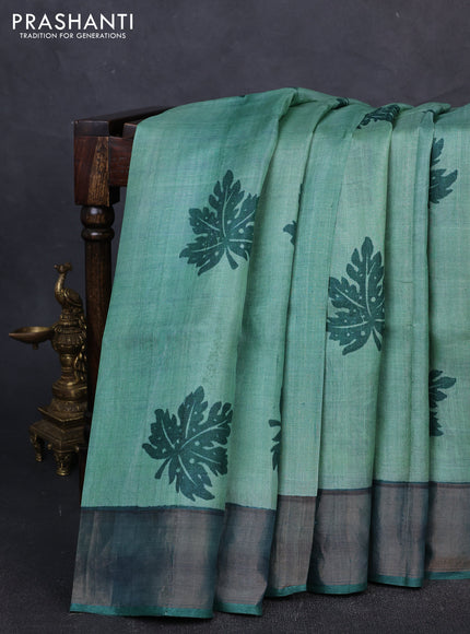Pure tussar silk saree green shade and green with leaf butta prints and zari woven border