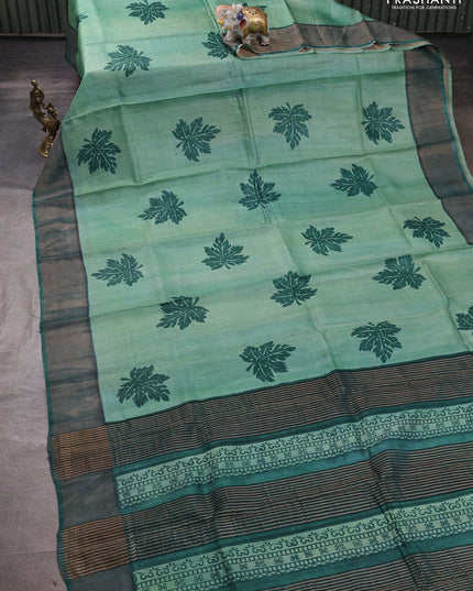 Pure tussar silk saree green shade and green with leaf butta prints and zari woven border