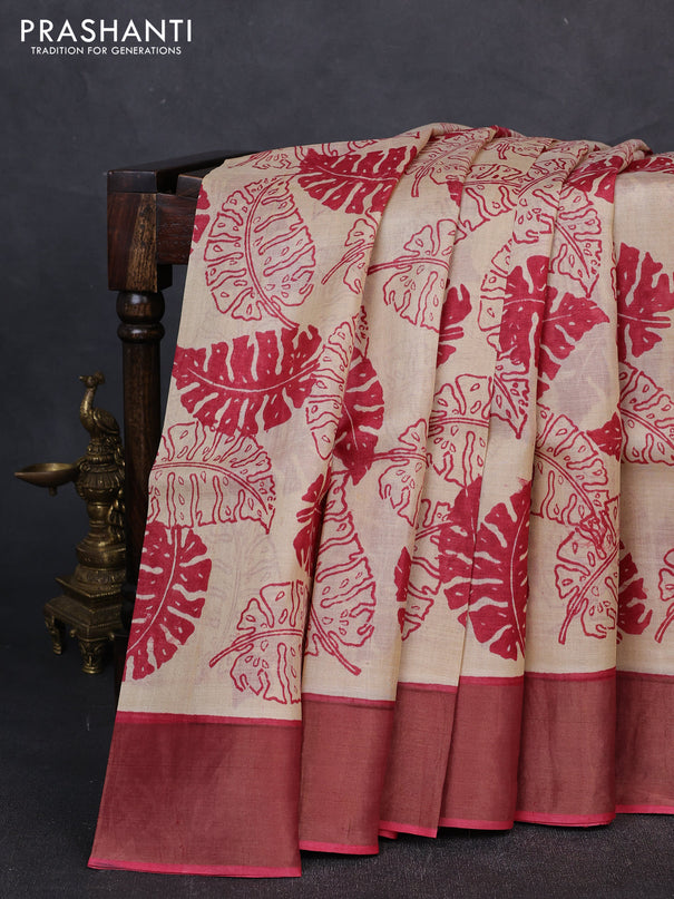 Pure tussar silk saree beige and pink shade with allover leaf prints and zari woven border