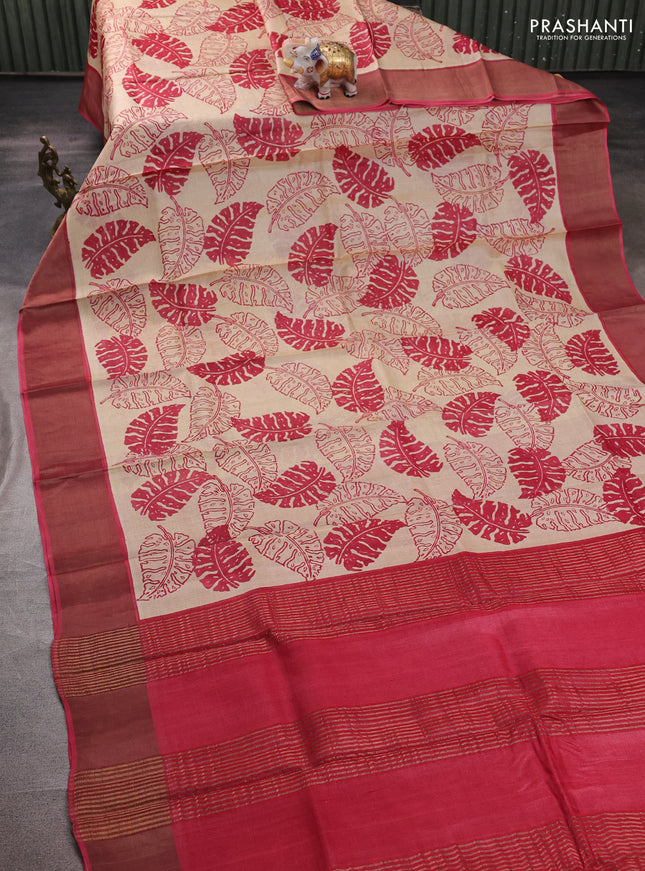Pure tussar silk saree beige and pink shade with allover leaf prints and zari woven border