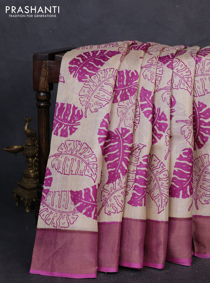 Pure tussar silk saree cream and mild purple with allover leaf prints and zari woven border