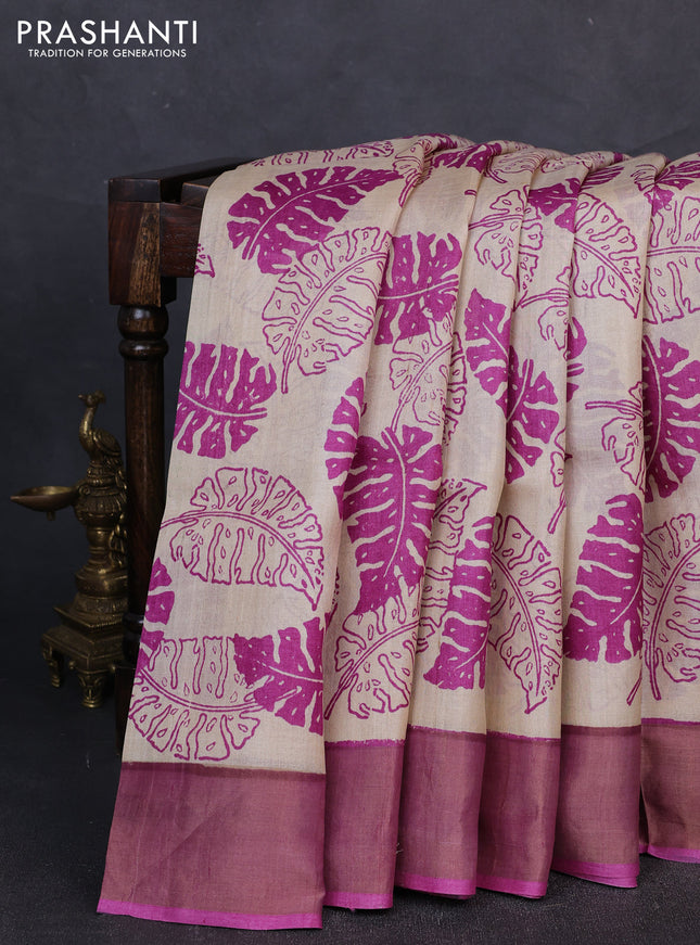 Pure tussar silk saree cream and mild purple with allover leaf prints and zari woven border