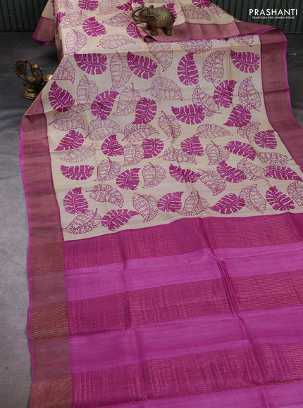 Pure tussar silk saree cream and mild purple with allover leaf prints and zari woven border