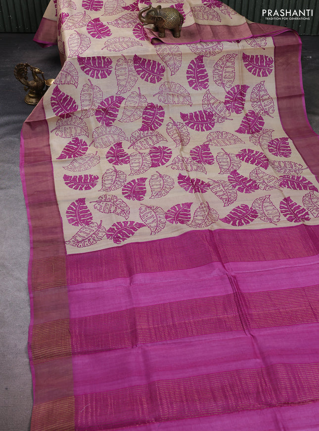 Pure tussar silk saree cream and mild purple with allover leaf prints and zari woven border