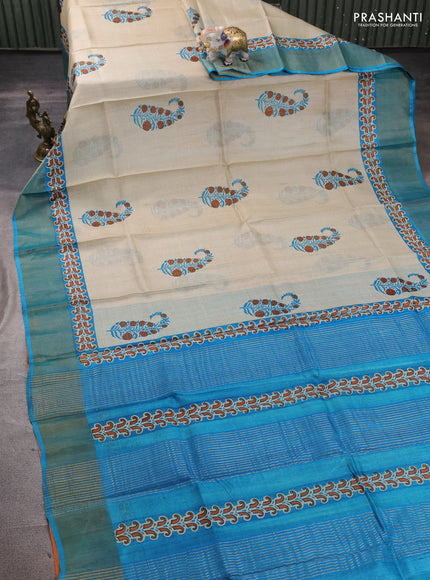 Pure tussar silk saree beige and cs blue with paisley butta prints and zari woven border