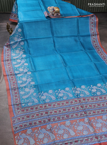 Pure tussar silk saree cs blue and peach shade with allover block prints and long block printed border