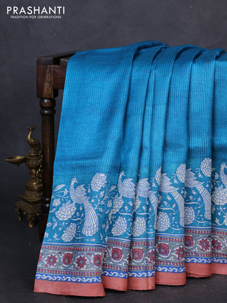 Pure tussar silk saree cs blue and pastel peach with allover block prints and long block printed border