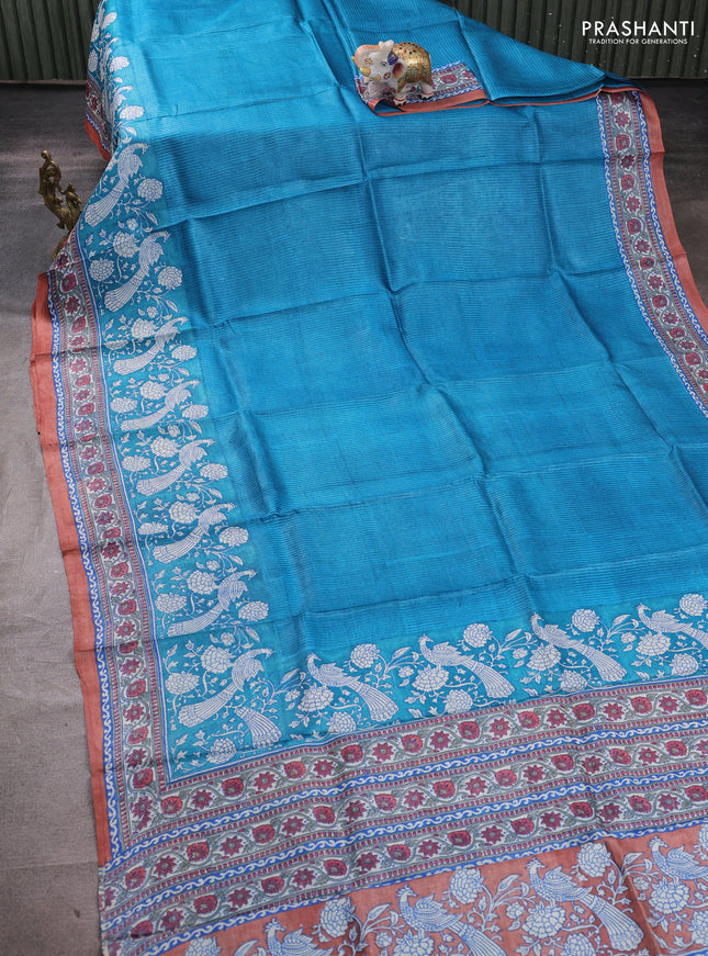 Pure tussar silk saree cs blue and pastel peach with allover block prints and long block printed border