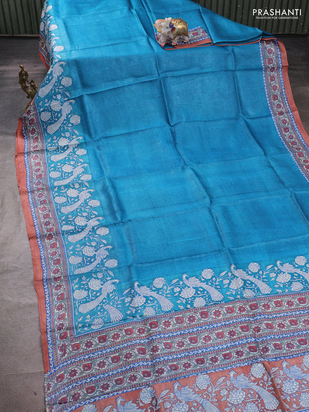 Pure tussar silk saree cs blue and pastel peach with allover block prints and long block printed border