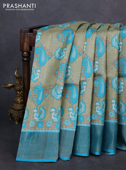 Pure tussar silk saree pastel green and cs blue with allover kalamkari prints and zari woven border