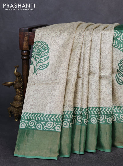 Pure tussar silk saree green with allover prints and zari woven border