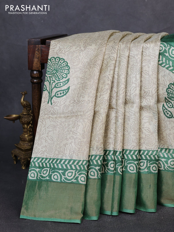 Pure tussar silk saree green with allover prints and zari woven border