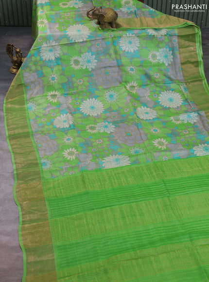 Pure tussar silk saree grey and parrot green with allover floral prints and zari woven border