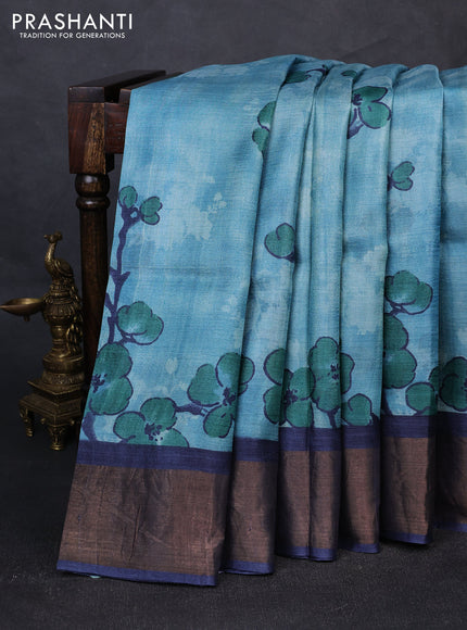 Pure tussar silk saree pastel blue shade and navy blue with allover prints and zari woven border