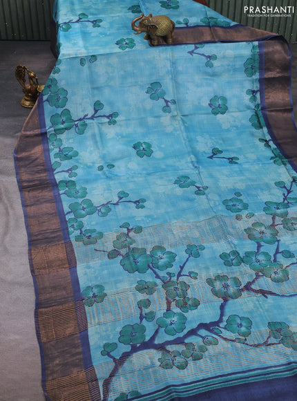 Pure tussar silk saree pastel blue shade and navy blue with allover prints and zari woven border