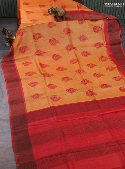 Pure tussar silk saree pale orange and red with leaf butta prints and zari woven border