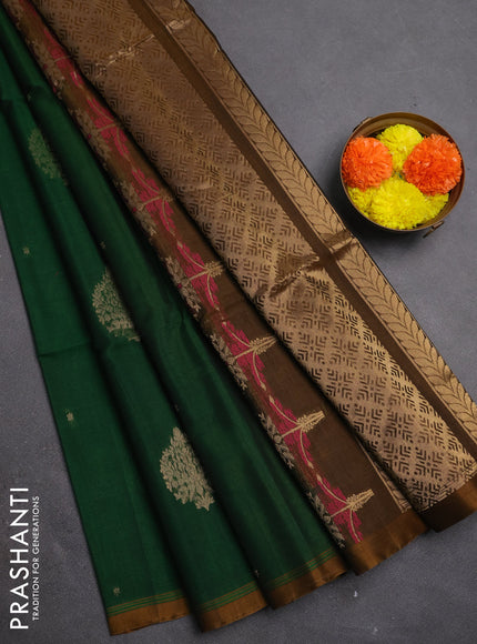 Kora silk cotton saree bottle green and dark mustard with allover zari woevn buttas and piping border