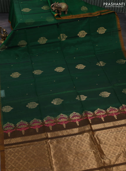 Kora silk cotton saree bottle green and dark mustard with allover zari woevn buttas and piping border
