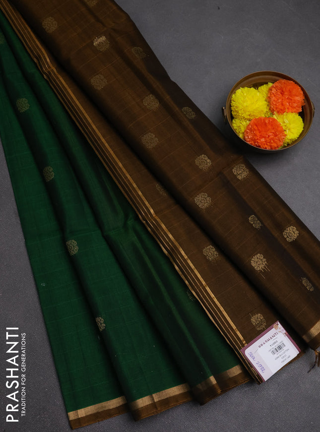 Kora silk cotton saree bottle green and dark mustard with allover zari woven buttas and small zari woven border